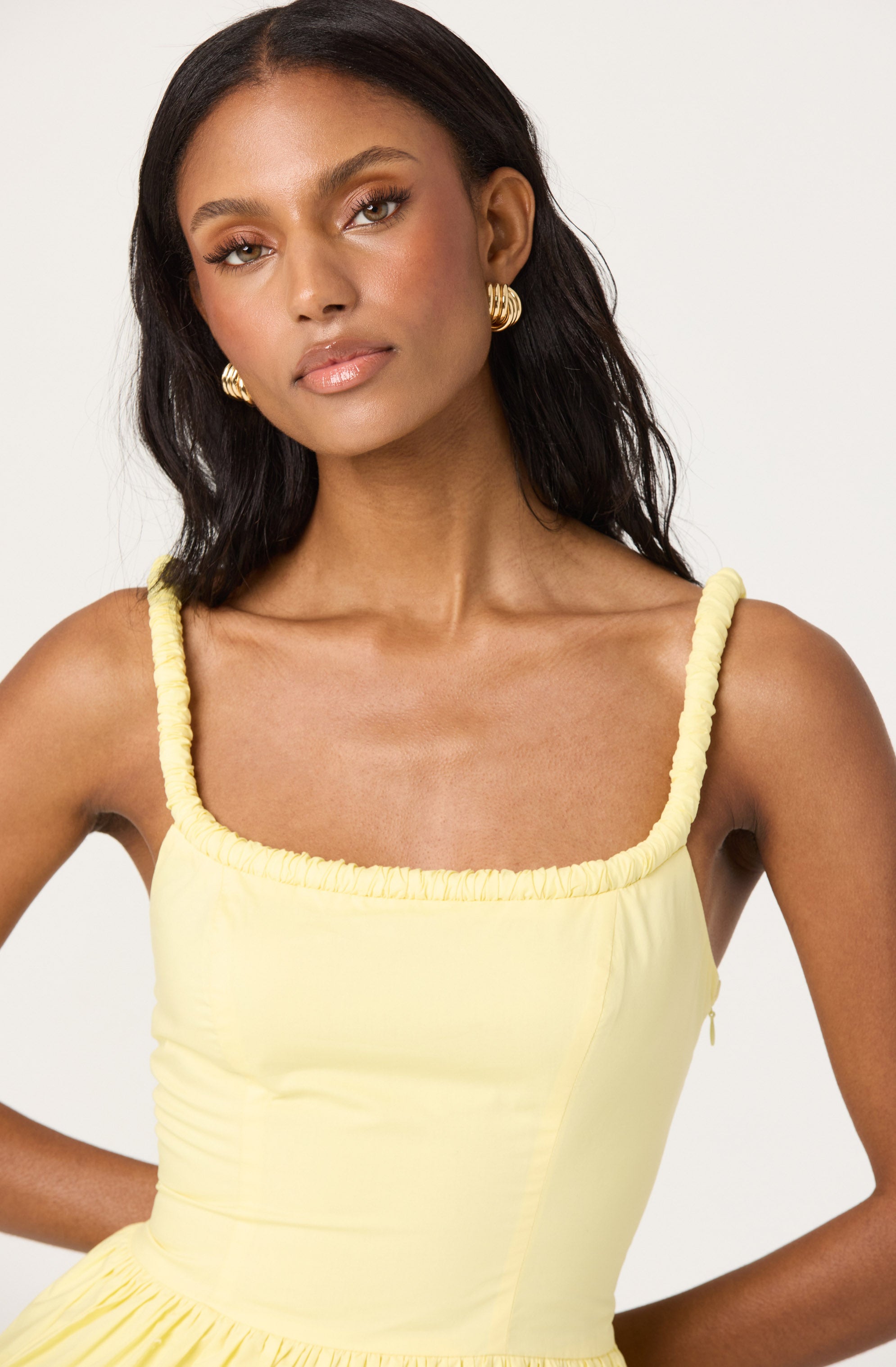 Sleeveless Bubble Hem Peplum Top